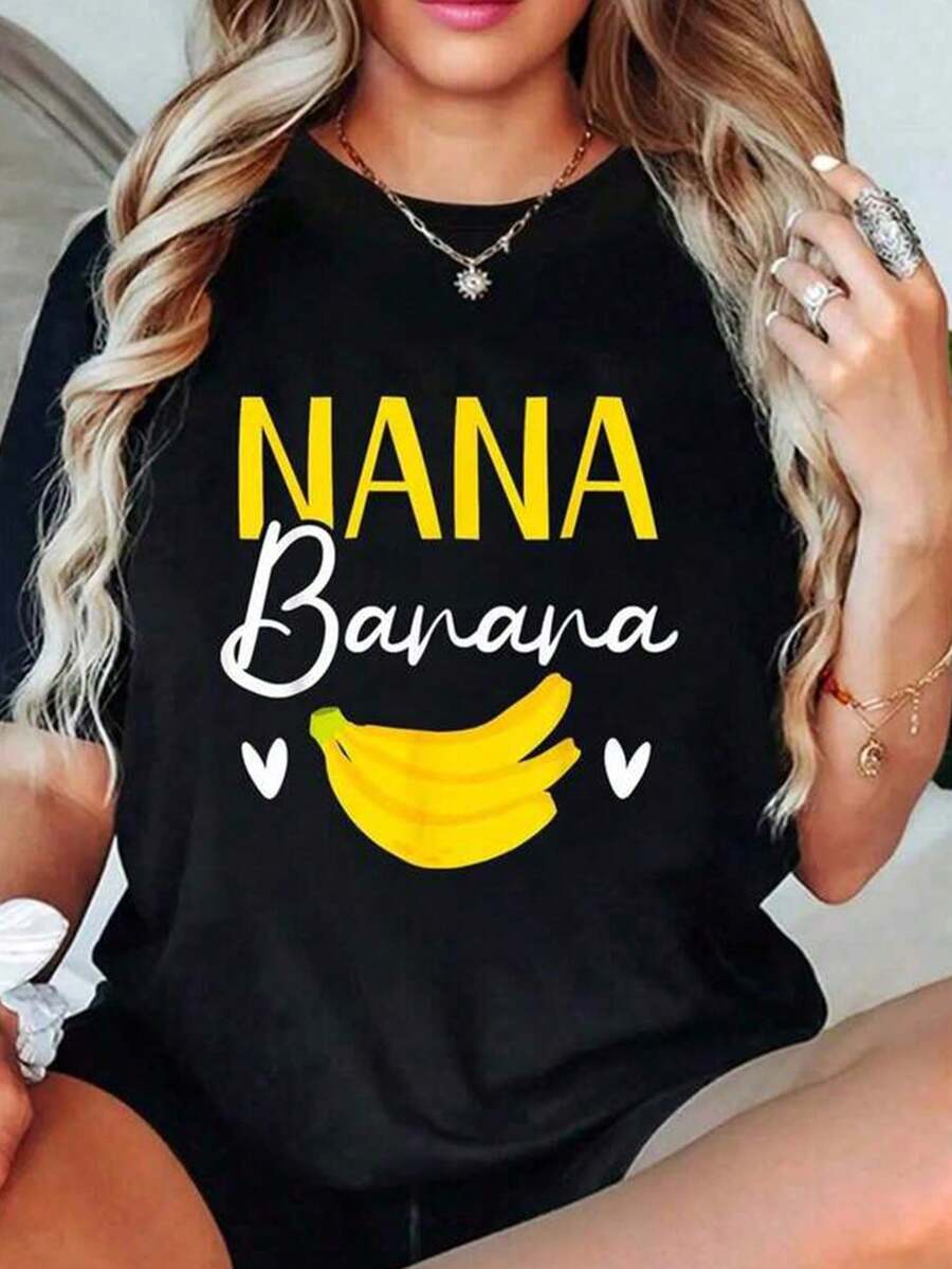 Mujer Camiseta de manga corta con estampado térmico de letras y plátanos en tonos amarillo y blanco, diseño de plátanos y corazones divertido, cuello redondo versátil - Negro - Ver 1