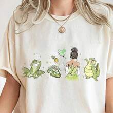 Camiseta de mujer de La Princesa Tiana y el Sapo: Conjunto oficial de la familia de princesas, con diseño de Tiana y una rana verde, color beige, apta para toda la familia, camiseta de manga corta, informal y versátil. - Blanco - Ver 1