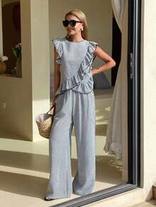 Conjunto casual de 2 piezas para vacaciones de verano para mujeres, con blusa de cuello redondo con volantes y rayas y pantalones rectos y sueltos - Blanco y Negro - Ver 7