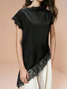 Blusa de mujer , de tela de piqué con lunares en blanco y negro, con empalme de encaje de unicolor y bajo asimétrico, elegante para citas y atuendos de verano - Negro - Ver 6