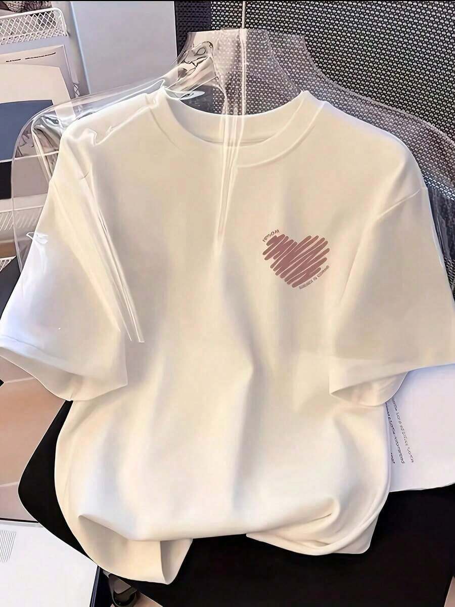 Camiseta de manga corta de talla grande para mujer - Corte holgado, estilo casual básico, elegante top de poliéster, camiseta de mujer - Cuello redondo con estampado de corazón, manga corta, transpirable y cómoda. - Blanco - Ver 1