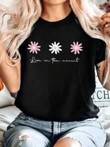 Women's Casual Black Off-Shoulder T-Shirt With Cute Floral Print And "Live In The Moment" Slogan, Short Sleeve Crew Neck Knit Top For Spring Outfits, Medium Knit Fabric, Regular Length EIRC - 黑色 - 查看 1