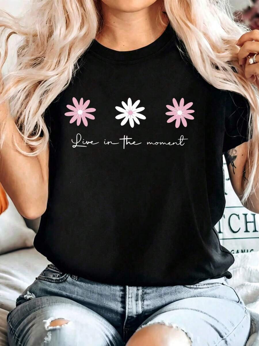 Women's Casual Black Off-Shoulder T-Shirt With Cute Floral Print And "Live In The Moment" Slogan, Short Sleeve Crew Neck Knit Top For Spring Outfits, Medium Knit Fabric, Regular Length EIRC - 黑色 - 查看 1