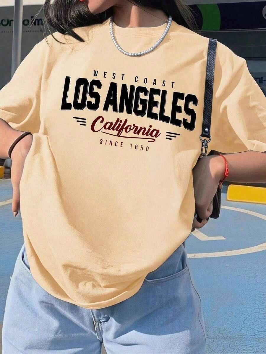Camiseta de manga corta con cuello redondo y estampado gráfico de Los Ángeles, California, para mujer, estilo casual y urbano. BJDB - Albaricoque - Ver 1