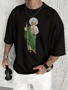 Thaddeus, The Apostle, Patron Saint Of Desperate Cases And Lost Causes, Is Depicted Holding A Wooden Staff And A Medallion Of Jesus Christ, Symbolizing His Unwavering Faith. T-Shirt, 100% Cotton. Thaddeus, Apostle, Patron Saint Of Desperate Causes. - 黑色 - 查看 1
