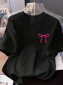 Camiseta de Mujer, Camiseta Casual de Talla Grande para Mujer con Estampado y Cuello Redondo, Ilustración de Lazo Rosa, Camiseta Estampada Adecuada para Uso Diario, Actividades al Aire Libre, Ocasiones Casuales y Festivas. Tops para Mujer - Negro - Ver 1