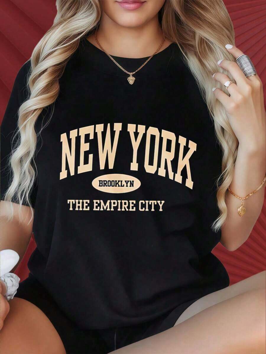 Camiseta de mujer con cuello redondo y mangas cortas, divertida para estampar. Camiseta de mujer con cuello redondo y mangas cortas, divertida para estampar. Camiseta negra de Nueva York, Brooklyn, la ciudad del imperio, para mujer, estilo casual, de gran tamaño, con estampado gráfico, top de moda urbana, adecuada para fiestas de Navidad, actividades deportivas, salidas de vacaciones, deportes y otros regalos festivos (220g). Adecuado para fiestas navideñas, actividades deportivas, fiestas de vacaciones, salidas, deportes y otros regalos navideños (220g). Playera - Negro - Ver 1