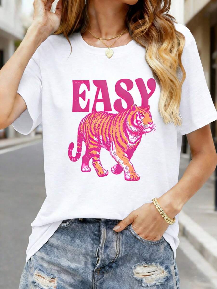 Camiseta de Tela Suave - Estilo Casual para Mujer con Estampado de Tigre EASY en Rosa. Camiseta de verano de algodón puro con cuello redondo para mujer. Top casual de manga corta. Diseño único para uso diario. Corte holgado, transpirable y suave. Perfecta para atuendos de vacaciones y días de descanso. Camiseta de moda. - Blanco - Ver 1