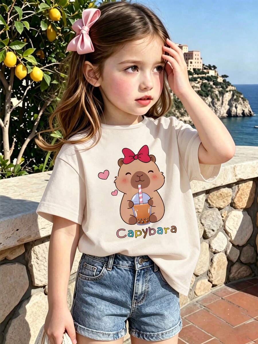 Camiseta de manga corta con estampado de letra y animal capibara con lazo para niñas, verano - Beis - Ver 1