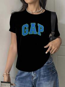 The Large Blue Lettering With Green Borders Represents Energy And Confidence In The Youthful Spirit, Creating A Modern And Active Feel. This Comfortable, Casual Women's T-Shirt Is Perfect For Everyday Wear. - 黑色 - 查看 8