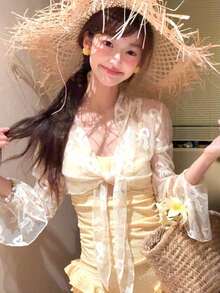 黄色のワンピース長袖ブラウスとカバーアップ水着女性用、2026年夏新作、美しく高級感のある海辺のリゾート水着、和菓子でキュートな水着 - イエロー - チェックする 4