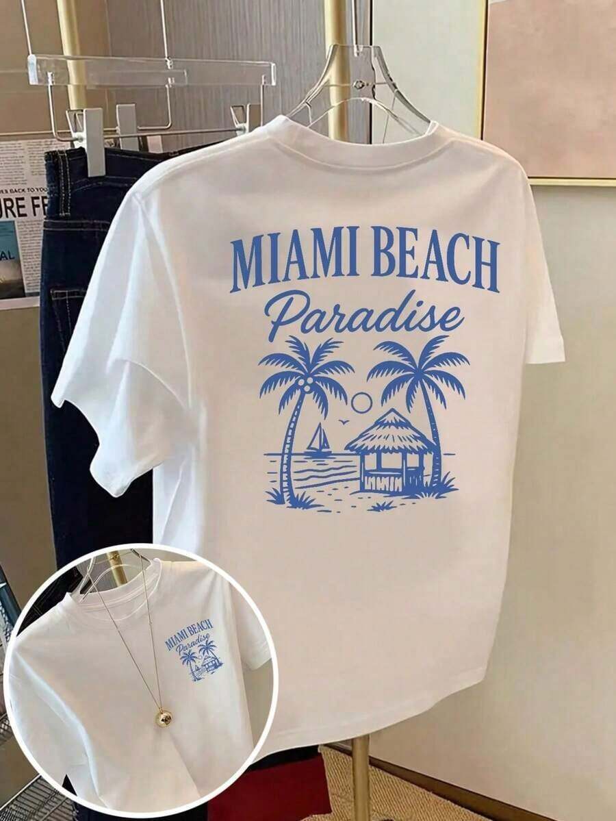 Camiseta de mujer con estética Y2K "MIAMI BEACH Paradise", camiseta de gran tamaño con estampado tropical de playa, estilo casual streetwear, manga corta y cuello redondo, top estampado vintage retro para vacaciones de verano, ropa de playa de verano, ideal para citas informales, brunch, fiestas, moda de vacaciones para adolescentes, camiseta holgada con estampado para mujeres jóvenes y amantes de los viajes. Cómoda y ligera. - Blanco - Ver 1