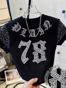 Camiseta de mujer con cuello redondo y bloque de color con pequeño estampado floral - Negro - Ver 1