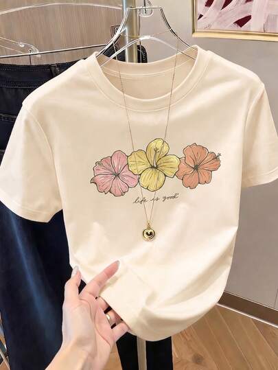 Camiseta de manga corta con estampado de flores para mujer, ropa de primavera, atuendo para festividades, color albaricoque para verano, look playero, estilo vacacional, estilo rural, atuendo de oficina para mujer.