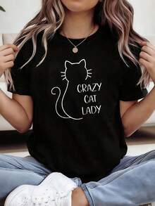 Camisetas vintage de manga corta con siluetas de animales sencillas, estampado de patrones, camiseta de talla grande para mujer de primavera/verano. Adecuado para reuniones de mascotas, sesiones de fotos en cafés para gatos y uso casual diario. Perfecto para crear un look casual de estilo urbano. 100% Algodón - Negro - Ver 1