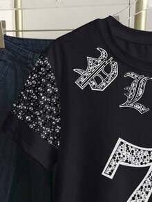 Camiseta de mujer con cuello redondo y bloque de color con pequeño estampado floral - Negro - Ver 4
