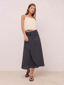 Falda midi envolvente con rayas diagonales, cierre lateral con lazo y bajo asimétrico.Silueta fluida con un drapeado favorecedor, perfecta para looks de primavera y verano, estilo casual chic y uso diario sin esfuerzo. - Verde militar - Ver 9