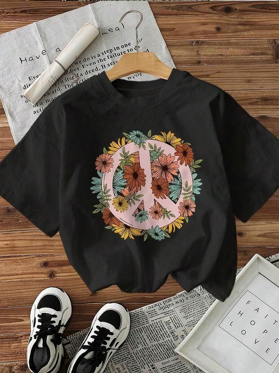 Camiseta de manga corta con cuello redondo, estampado floral, corte holgado, de tela suave, para mujer, estilo casual urbano. - Negro - Ver 1