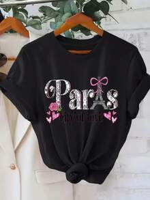 Camiseta de tela suave con estampado, cuello redondo, manga corta, estilo casual, para primavera y verano, camiseta de moda para mujer. - Negro - Ver 1