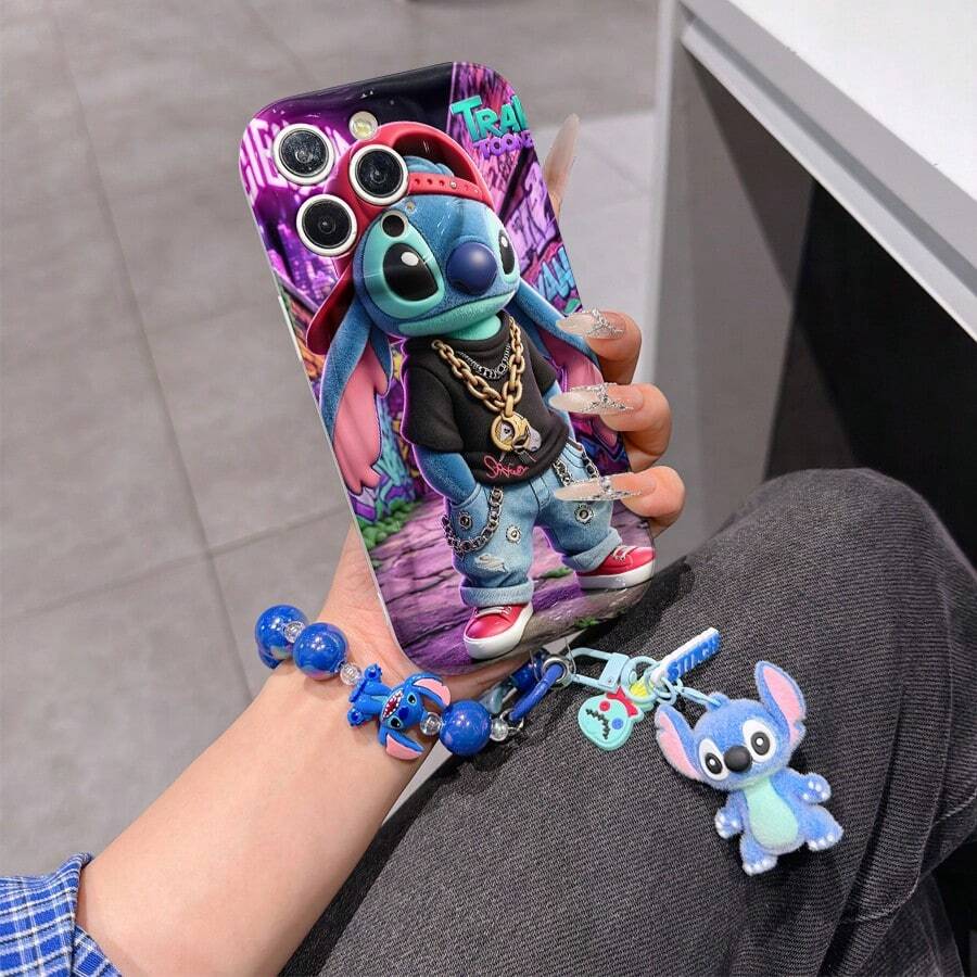 Disney Lilo & Stitch Phone Case With Stitch Charm And Stitch Lanyard - Cute Stitch Protective Case With Hip-Hop Outfit And Graffiti Background Design, Equipped With Delicate Stitch Decorative Lanyard And Beaded Bracelet For Easy Carrying, Compatible With IPhone 17, 16, 15, 14, 13, 12, 11 Pro Series, Ideal For Birthdays, Holidays, Anniversaries, Graduation Gifts, Or Any Special Occasion To Surprise Family, Friends, Classmates, And Loved Ones. - 白色 - 查看 1