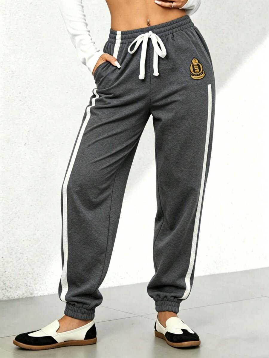 Pantalones largos informales sólidos con efecto de mezclilla y encaje lateral para mujeres - Gris Oscuro - Ver 1