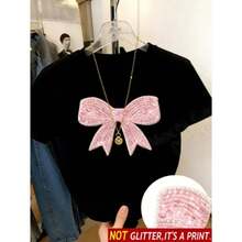 Camiseta de manga corta para mujer nueva temporada verano con estampado de lazo rosa simulando brillo cuello redondo corte ajustado favorecedor estilo dulce y cool no es purpurina es estampado - Negro - Ver 7