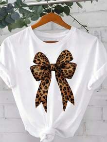 1 Pieza de Camiseta Casual de Moda para Hombres y Mujeres, con Estampado de Leopardo, Decoración de Lazo, Cuello Redondo y Manga Corta. Versátil, fácil de combinar, adecuada para uso diario, estilo urbano, ropa de vacaciones y de fin de semana. - Blanco - Ver 7