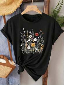 Camiseta de manga corta para mujer, estilo elegante, con estampado de flores silvestres, cuello redondo, adecuada para primavera, verano y otoño, a para ir al trabajo, vacaciones, uso diario, estilo casual elegante y vintage, de algodón. - Negro - Ver 6