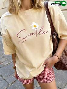 Camiseta de manga corta para mujer con cuello redondo, corte holgado, con estampado de flor de margarita y leyenda cursiva "Smile", apta para uso diario, salidas casuales, fines de semana, vacaciones, actividades al aire libre y reuniones informales, fabricada en poliéster, de estilo casual fresco juvenil, ideal para usar en primavera y verano. Envío nacional dentro del país. - Albaricoque - Ver 1