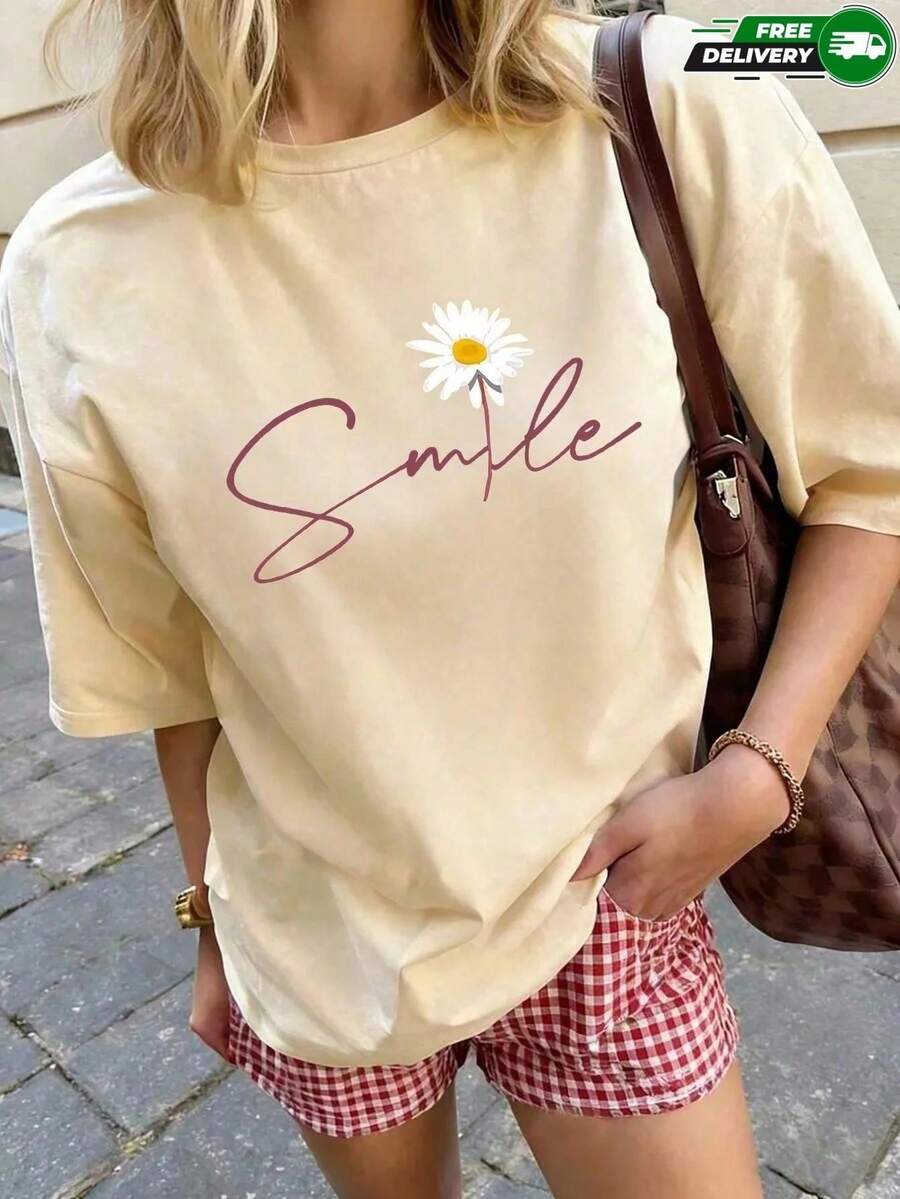 Camiseta de manga corta para mujer con cuello redondo, corte holgado, con estampado de flor de margarita y leyenda cursiva "Smile", apta para uso diario, salidas casuales, fines de semana, vacaciones, actividades al aire libre y reuniones informales, fabricada en poliéster, de estilo casual fresco juvenil, ideal para usar en primavera y verano. Envío nacional dentro del país. - Albaricoque - Ver 1