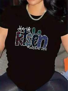 Camiseta negra para mujer con diseño brillante de "Él ha resucitado" - Poliéster ligero, ajuste cómodo, perfecta para uso casual y decoración del hogar, con referencia a una Escritura inspiradora, camiseta para el día a día.|   Diseño de Texto Brillante|   Camisa de ajuste cómodo - Negro - Ver 1