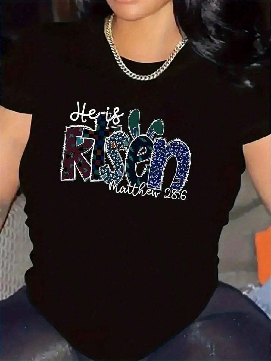 Camiseta negra para mujer con diseño brillante de "Él ha resucitado" - Poliéster ligero, ajuste cómodo, perfecta para uso casual y decoración del hogar, con referencia a una Escritura inspiradora, camiseta para el día a día.|   Diseño de Texto Brillante|   Camisa de ajuste cómodo - Negro - Ver 1