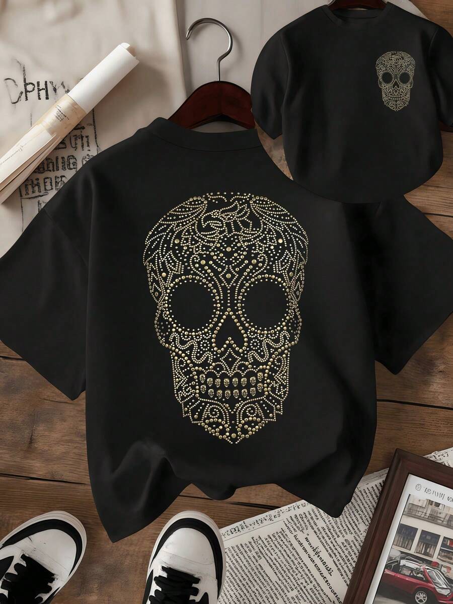 Cráneo brillante formado por patrones dorados que simbolizan la energía eterna y la conexión con la vida decorado con detalles que evocan elegancia y renacimiento camiseta de mujer de doble cara con estampado artístico - Negro - Ver 1