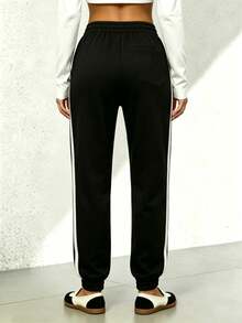 Pantalones largos informales sólidos con efecto de mezclilla y encaje lateral para mujeres - Negro - Ver 4