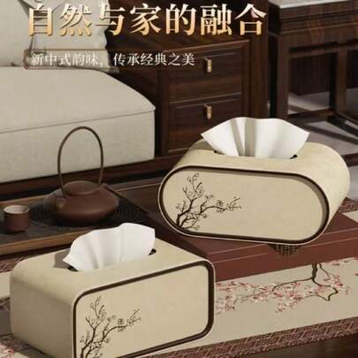 这款新款中式梅花图案PU皮纸巾盒外观时尚高端，采用椭圆形设计和磁扣闭合。它是一款装饰性收纳用品，适用于客厅、床头柜、卧室和浴室梳妆台。