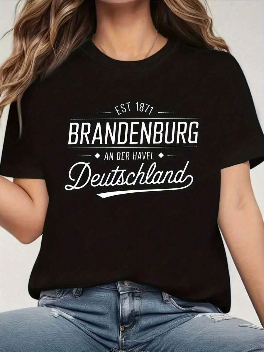 Camiseta de mujer con temática alemana y diseño de la Puerta de Brandeburgo - Estampado en blanco y negro de Alemania con la bandera alemana y el contorno del estado, corte holgado, manga corta, cuello redondo, letras "Brandybourg" y "1990" para el orgullo alemán, diseño "Baviera-Distancia". - Negro - Ver 1