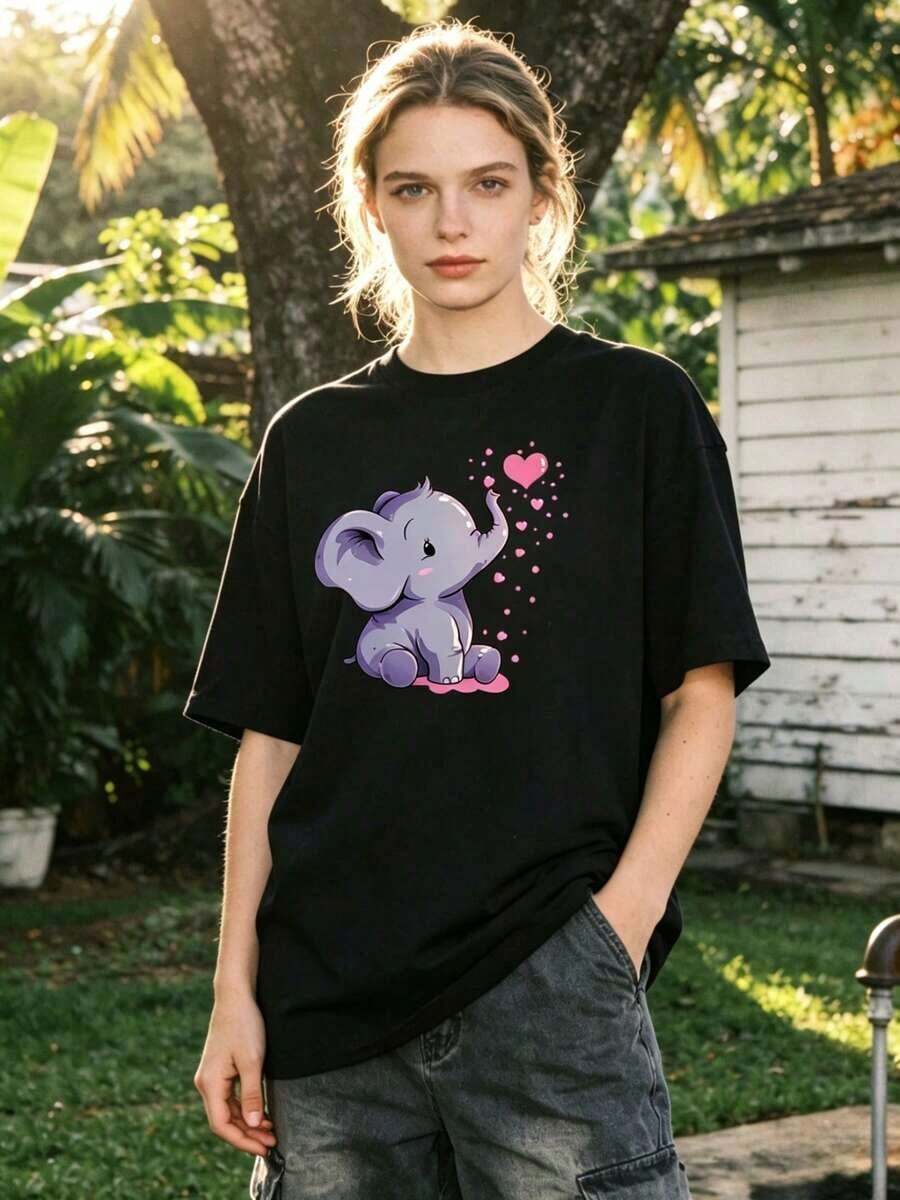 Diseño simple y versátil, camiseta de manga corta de cuello redondo suave y casual para mujer, camiseta de manga corta con estampado de dibujos animados de elefante, camiseta casual de verano para mujer, top, 100% algodón, estilo vintage, estilo callejero europeo y americano, casual deportivo, unisex, estilo casual urbano, top de alta calidad, camiseta de algodón. - Negro - Ver 1