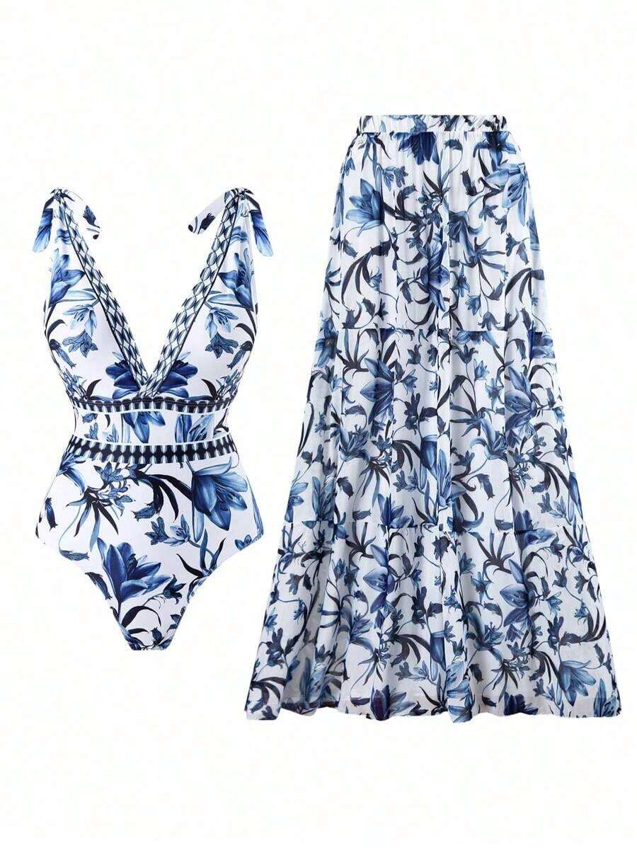 Swim Oasis Traje de baño de una pieza con cuello en V, estampado floral azul, diseño halter y espalda descubierta, con falda transparente.Atuendo de playa de verano de alta gama para mujer - Azul y blanco - Ver 1