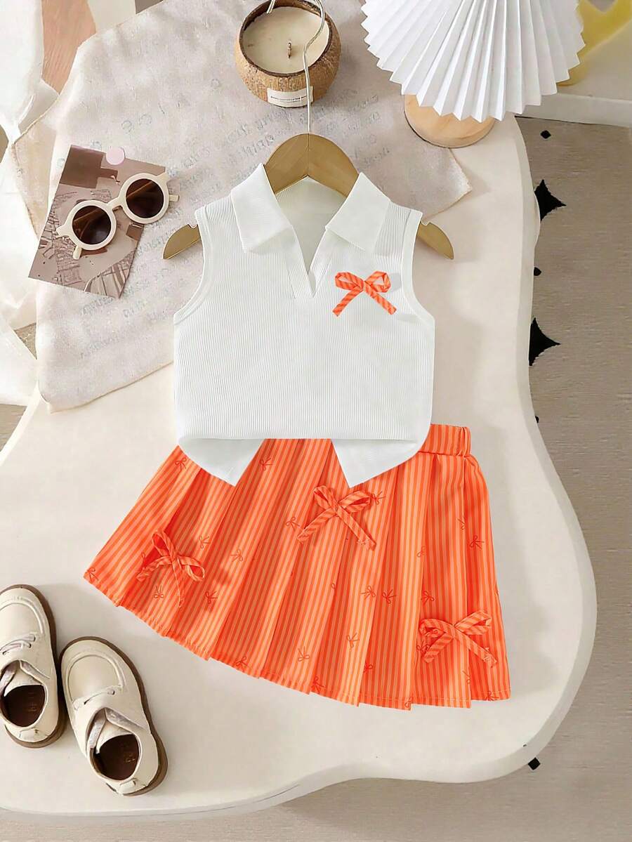 Conjunto de 2 piezas de top de punto acanalado de cuello en V blanco + falda con estampado de lazo a rayas verticales para niñas, adecuado para uso diario, actividades al aire libre y diversas ocasiones, primavera/verano - Naranja - Ver 1