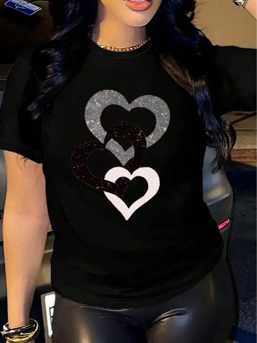 YOCASA Camiseta informal de verano para mujer, de cuello redondo, ajustada y manga corta, con estampado de pintura al óleo, floral, de corazones, de cerezas y de letras. Tejido informal sencillo, estilo deportivo, ideal para el día a día y para una cita de San Valentín. - Negro - Ver 1