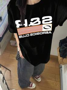T-shirt negra estilizada moderna con diseño deportivo única versátil cómoda para el día a día adecuada para jóvenes talla única casual moda urbana  actual - Negro - Ver 1