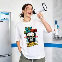 Ropa de verano para mujer, camiseta de algodón suave y casual con cuello redondo, estampado de calaveras, ojos y rayos de THE WET BANDITS POWER SUPPLY CO. Color blanco. - Blanco - Ver 2
