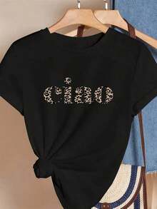 Camiseta de mujerCamiseta casual de manga corta para mujer con estampado de leopardo, negra con patrón de animal beige, hecha de tela ligera y transpirable, ideal para primavera y verano, lavable a máquina, diseñada para la comodidad diariaCómoda y ligera - Negro - Ver 1
