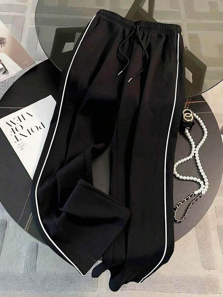 Pantalones rectos de corte holgado para mujer con ribete de encaje - Negro - Ver 1