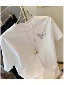 Short-Sleeved T-Shirt With A Round Neck, Comfortable And With A Small Butterfly Print, Ideal For Casual Outdoor Activities At Home. - White - View 1