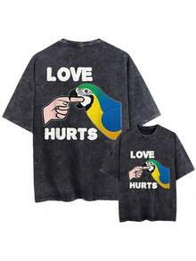 Camiseta unisex vintage lavada, holgada, negra, de manga corta, ropa unisex estampada, diseño de loro mordiendo el corazón, camiseta con estampado de guacamaya azul y dorada, camiseta lavada, talla grande, 6 tallas disponibles. - Negro - Ver 1