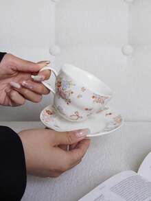 1件套小巧精致的陶瓷咖啡杯碟套装，饰有蝴蝶结，简约花卉图案，蕾丝花边点缀，适合家居装饰、餐桌摆设、咖啡店拉花杯、下午茶甜点蛋糕碟、花茶和红茶杯碟套装、礼品、节日装饰。 - 彩色 - 查看 7