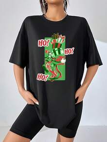 Cheerful Christmas Figure With A Fun Character And Wrapped Gifts Symbolizing Festive Enthusiasm And The Positive Energy Of Sharing During The Celebration Season. Comfortable And Soft Women's T-Shirt Ideal For Everyday Wear. - 黑色 - 查看 1