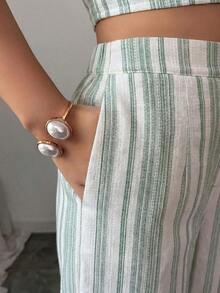 Nuevo conjunto de 2 piezas de primavera/verano con top sin mangas de lino texturizado a rayas azul y blanco, y pantalones casuales acampanados con bolsillos duales, elegante estilo casual - Verde - Ver 5