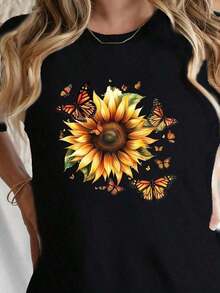 Camiseta de mujer1 pieza Camiseta gráfica de girasol y mariposa Bloom & Fly - Cuello redondo suave, mangas cortas ligeras - Perfecta para ropa casual de primavera y verano - Top de moda para mujeres 180g 100% algodón suaveCómoda y ligera - Negro - Ver 6